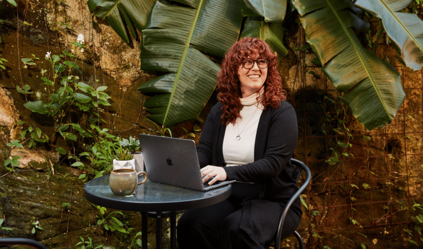 Woman working at garden table