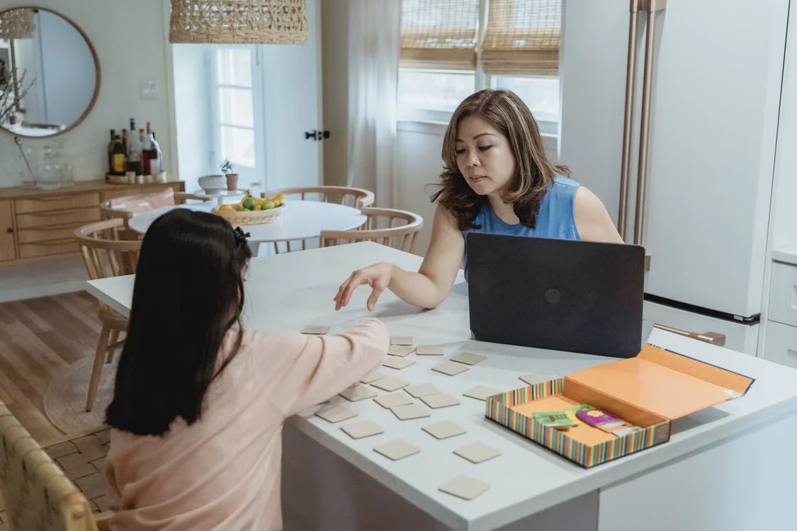 Employee using laptop to view a dashboard on data analysis