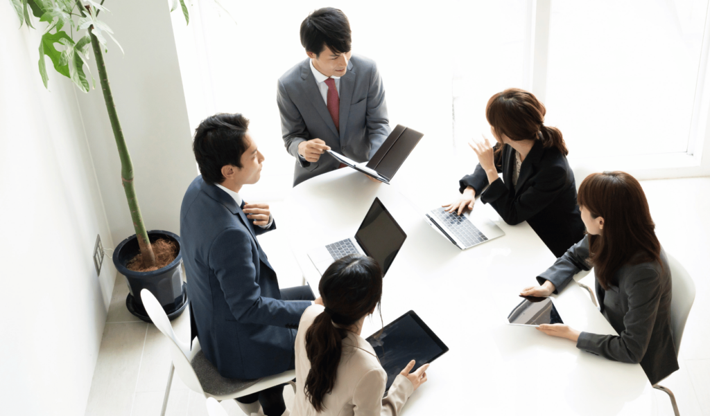 a group of colleagues working together at a table