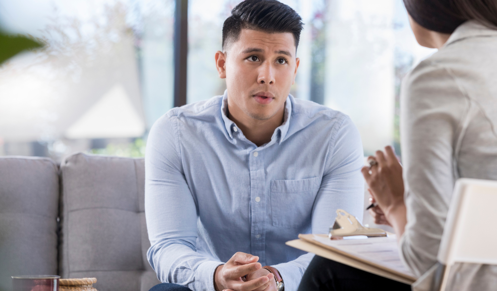 employee chatting to a colleague in the office