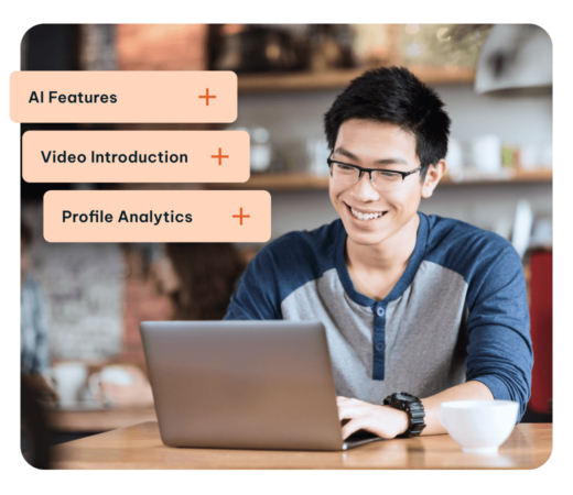 An image of a man smiling on his laptop with floating widgets showing AI Features, Video Introduction, Profile Analytics