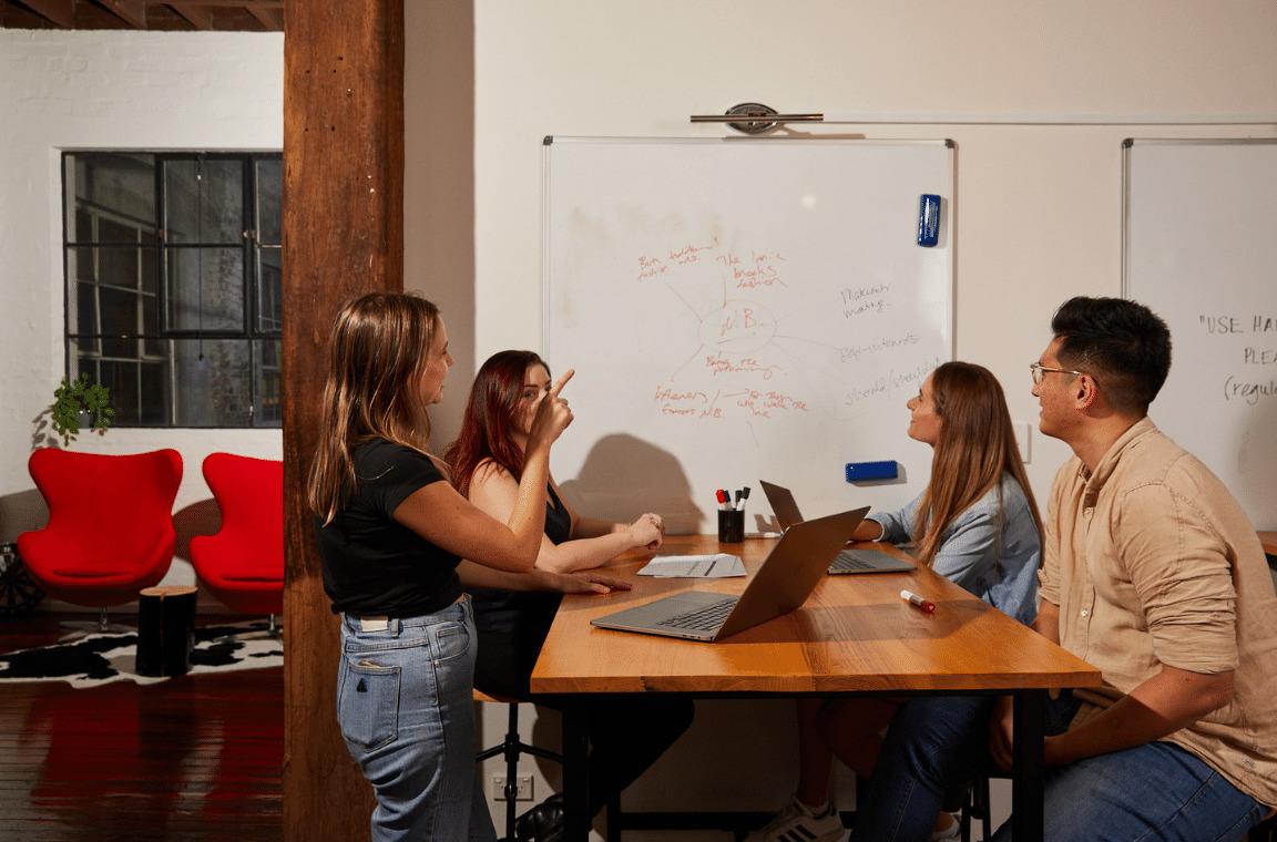 a group of colleagues having a discussion