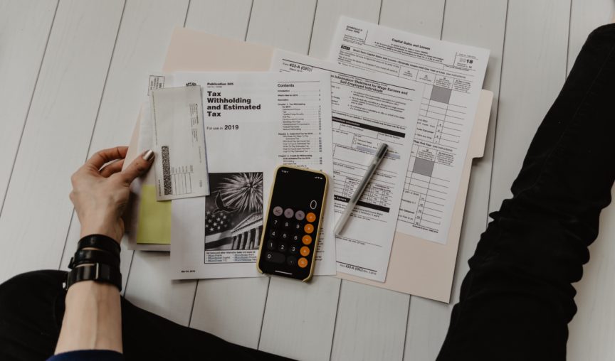 pile of paper on the floor of payroll tax for Australian state territory