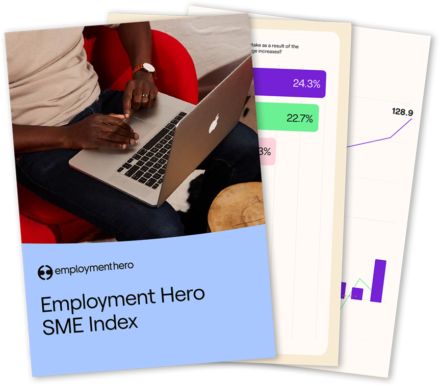 This image features a cover of a report titled "Employment Hero SME Index" alongside partially visible pages showing graphs and data visuals. The cover has a light blue background with the Employment Hero logo and an image of a person working on a laptop in a casual setting. The overall design is professional and engaging, highlighting data insights relevant to SMEs.