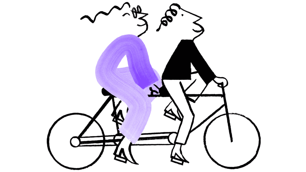 Quinn and a friend on a bicycle