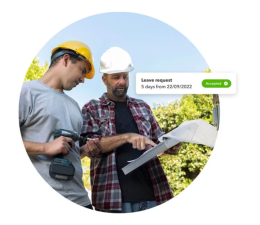 A photo of two construction workers, one in a yellow hard hat and the other in a white hard hat, discussing a project with a clipboard on-site. A digital overlay shows a leave request notification stating, "Leave request accepted: 5 days from 22/09/2022,"